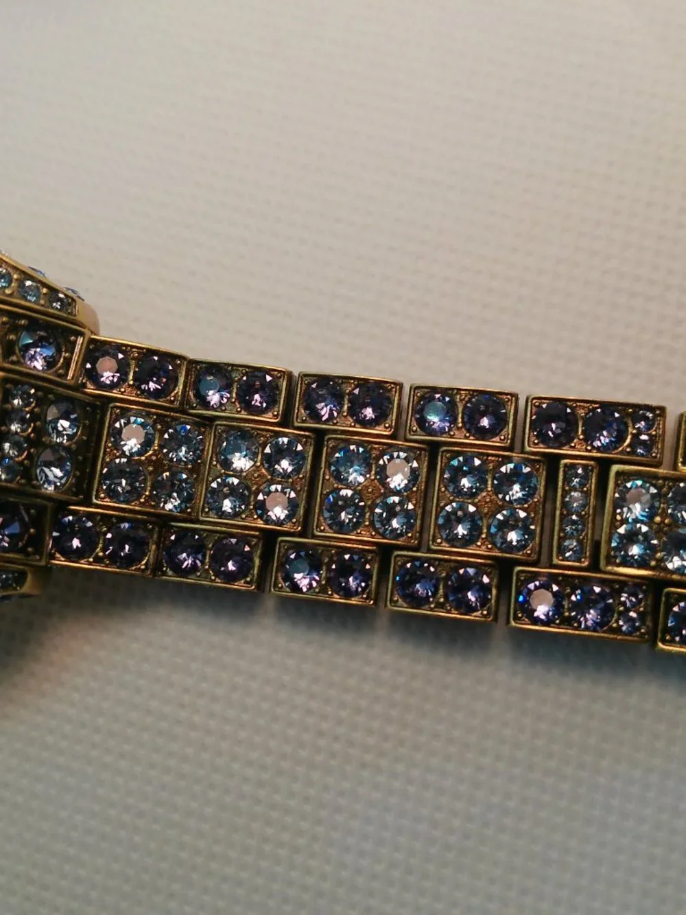 Heidi Daus quartz fashion watch bronze-tone covered with lavender-purple crystal